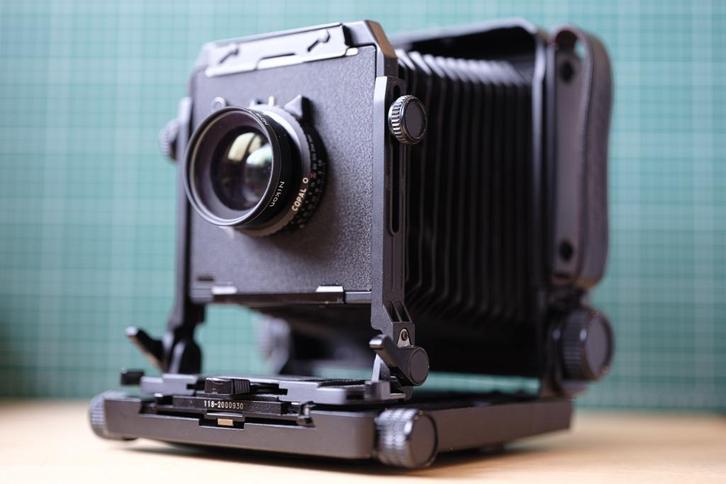 Toyo 4x5" met Nikkor f 5,6 - 150mm Copal 0 centraal sluiter, Audio, Tv en Foto, Fotocamera's Analoog, Zo goed als nieuw, Spiegelreflex