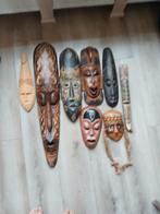 houten maskers, Ophalen