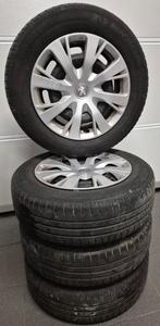 Set zomerbanden met wieldoppen afkomstig van Peugeot, Ophalen