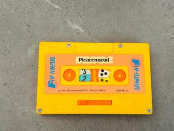 Vintage Flip-Flappers piratengoud van MB uit 1987 beschikbaar voor biedingen