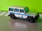 Matchbox - 2014 Mercedes G550 Jurassic Park [grijs] 1/60, Ophalen of Verzenden, Zo goed als nieuw, Auto