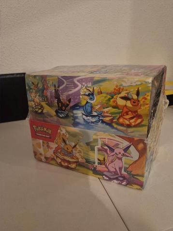 Prismatic evolutions mini tin. beschikbaar voor biedingen