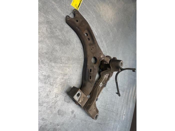 Draagarm links-voor van een Volkswagen Caddy, Auto-onderdelen, Ophanging en Onderstel, Volkswagen, Gebruikt, 3 maanden garantie