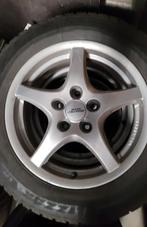 Opel aluminium velgen met winterbanden, Ophalen, Gebruikt