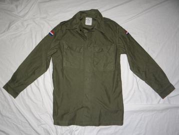 Leuke groene LEGER blouse (orgineel) beschikbaar voor biedingen