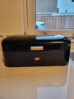 Wesco broodtrommel, Ophalen