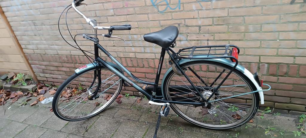 Gazelle fiets medium maat in goede staat Den Helder centrum, Fietsen en Brommers, Ophalen, Gebruikt, Verstelbare zitting