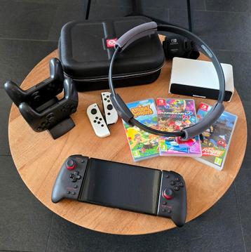 Nintendo Switch OLED + Pro Controllers + Games + Accessoires beschikbaar voor biedingen