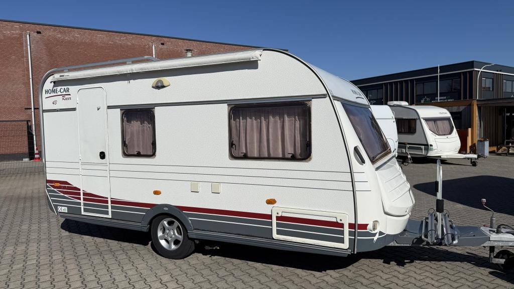 Home-Car Racer 43 AFM bouwjaar 2005 met voortent & z, Caravans en Kamperen, Caravans, Home-car, Bedrijf, Treinzit, 750 - 1000 kg