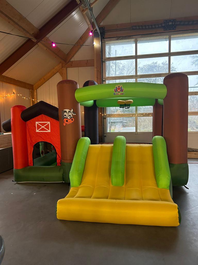 Springkussen boerderij met glijbaan, Ophalen, Zo goed als nieuw