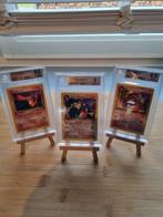 1st edition Dark Charizard, Charmander en charmeleon graded, Ophalen of Verzenden, Zo goed als nieuw, Losse kaart, Foil