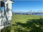 Stacaravan te koop aan het water op 5* camping Friesland, Tot en met 5