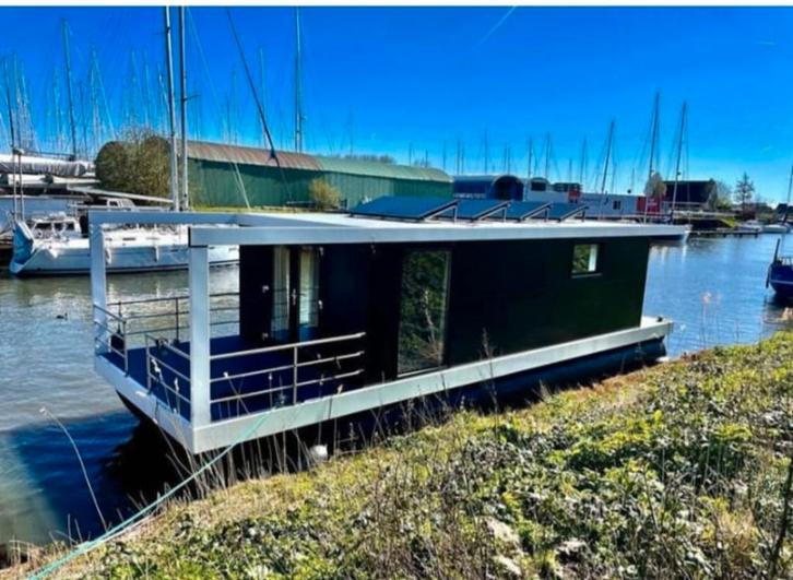 Nomia houseboat woonboot boot woonark havenlodge 12x4, Watersport en Boten, Motorboten en Motorjachten, Gebruikt, Overige materialen