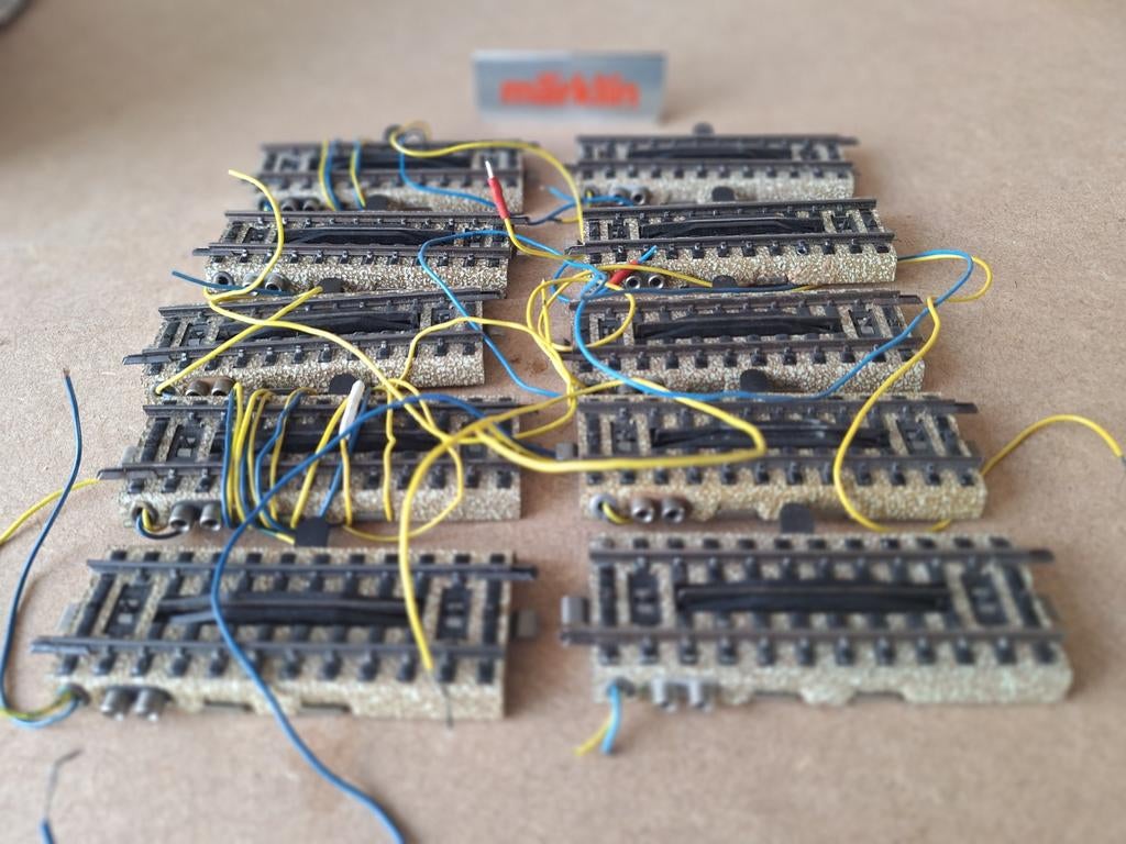 Märklin 5112 H0 Elektrische ontkoppelrail M-Rails, Hobby en Vrije tijd, Modeltreinen | H0, Wisselstroom, Gebruikt, Rails, Ophalen of Verzenden