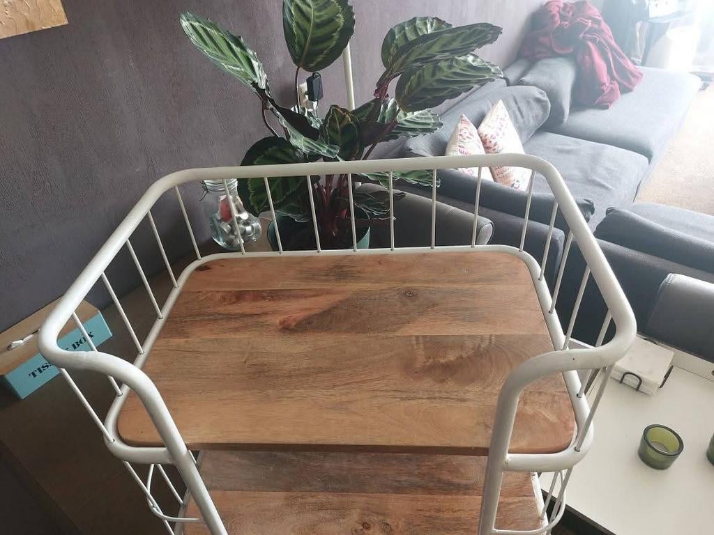 Leuke lage bakkerskar op wieltjes, Ophalen