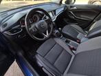 Opel Astra Sports Tourer 1.2 Business Elegance Dealer onderh, Auto's, Gebruikt, Euro 6, 1199 cc, Blauw