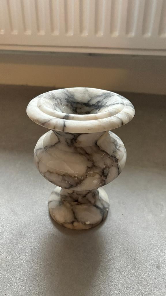 marmeren vaas, Ophalen