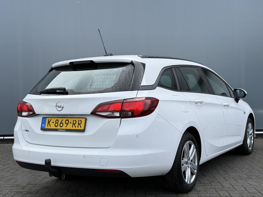 Opel Astra Sports Tourer BJR 2021 1.2 111 PK Edition TREKHAA, Voorwielaandrijving, Stof, Gebruikt, Euro 6