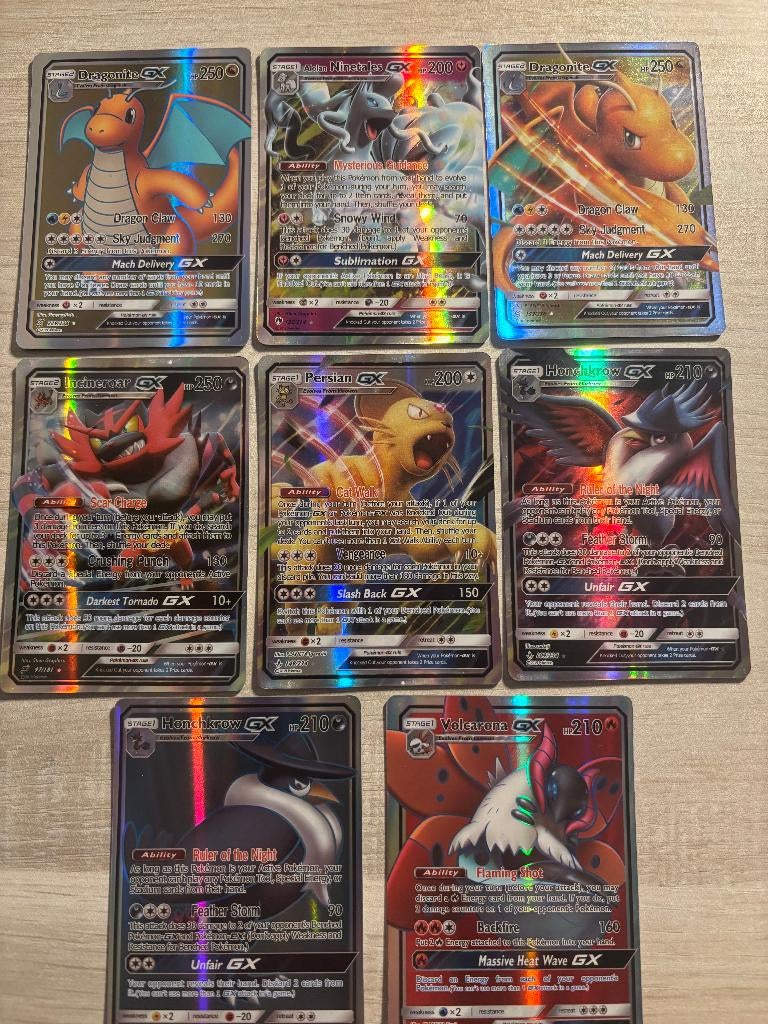 8 GX pokemonkaarten, Ophalen of Verzenden, Zo goed als nieuw, Meerdere kaarten, Foil