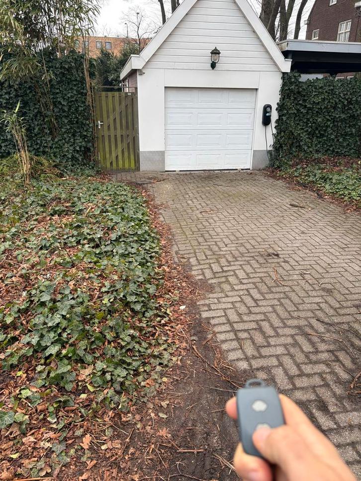 Sectionaaldeur / Roldeur met 2 afstandsbedieningen, Doe-het-zelf en Verbouw, Deuren en Horren, Gebruikt, Garagedeur, 200 tot 215 cm