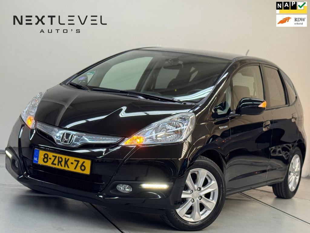 Honda Jazz 1.4 Hybrid Elegance Panoramadak DealerOnderhouden, Auto's, Honda, Euro 5, Gebruikt, 4 cilinders, Bedrijf