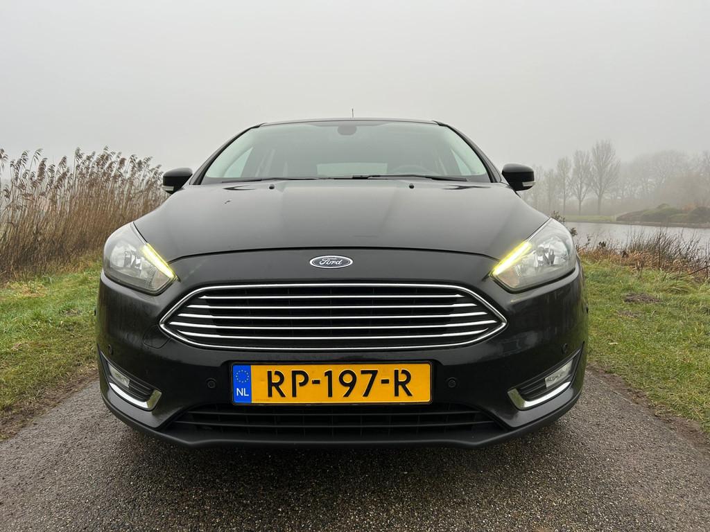 Ford FOCUS Wagon 1.0 126 PK Titanium Navi / Clima / Keyless, Stof, Gebruikt, Zwart, Origineel Nederlands