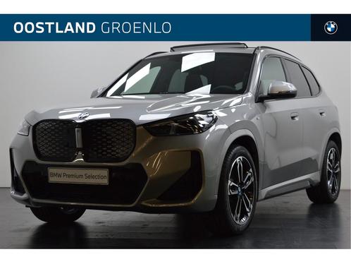 BMW iX1 eDrive20 M Sport / Panoramadak / Trekhaak / Achterui, Auto's, BMW, Bedrijf, Te koop, iX1, Achteruitrijcamera, Alarm, Bochtverlichting