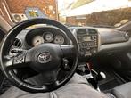 Toyota RAV4 2004 Grijs metallic., Auto's, 1360 kg, Stof, 4 cilinders, Handgeschakeld