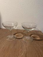 2 Champagnecoupes, Ophalen