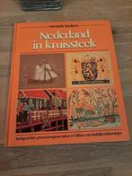 Nederland in kruissteek, Ophalen of Verzenden, Gelezen, Overige onderwerpen