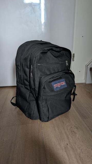 JanSport Rugzak Zwart - Laptopvak beschikbaar voor biedingen
