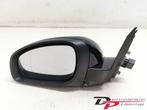 Buitenspiegel links van een Opel Signum
