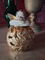 Engel of cherubijn op een goudkleurige bol., Ophalen of Verzenden, Zo goed als nieuw