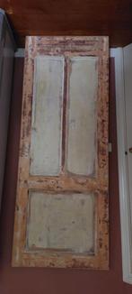 Oude antieke paneeldeur, Ophalen