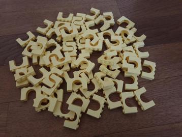 Partij N262=50x Nieuwe Lego boogstenen in licht geel beschikbaar voor biedingen