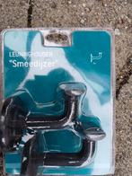 LEUNING HOUDERS SMEEDIJZER. 4 STUKS. PERTURA., Ophalen of Verzenden, Zo goed als nieuw, Rvs