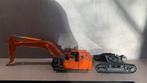 Wsi hitachi ZX 870, Hobby en Vrije tijd, Modelauto's | 1:50, Ophalen of Verzenden, Zo goed als nieuw, Bus of Vrachtwagen, Wsi