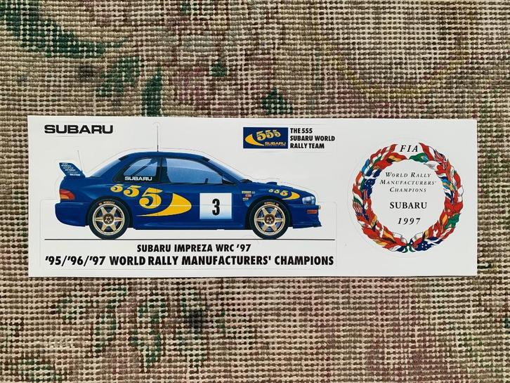 Vel met 4 stickers Subaru Impreza WRC 1997, Boeken, Auto's | Folders en Tijdschriften, Nieuw, Overige merken, Ophalen of Verzenden