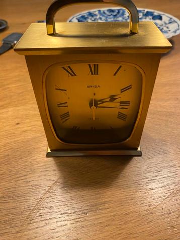 Klokje swiza goudkleur zwiters beschikbaar voor biedingen