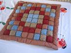 Nieuw, gewatteerde patchwork quilt kussen., Ophalen of Verzenden, Nieuw, Vierkant
