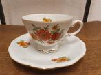 Vintage, Kronester: Kop en schotel oranje bloem goudrandje, Ophalen of Verzenden