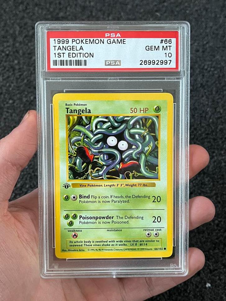 Pokémon PSA 10 1st edition Tangela #66 Base set, Hobby en Vrije tijd, Verzamelkaartspellen | Pokémon, Zo goed als nieuw, Losse kaart