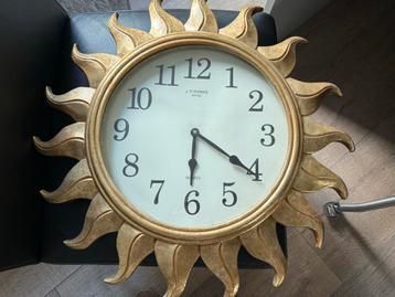 Prachtige goudkleurige zonneklok recency style J.P. Dumas beschikbaar voor biedingen