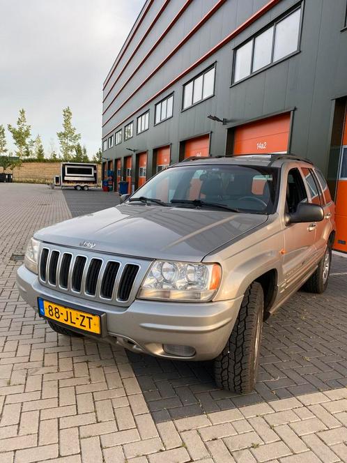 Jeep Grand Cherokee 4.0 I AUT 2002 Grijs, Auto's, Jeep, Particulier, Grand Cherokee, 4x4, ABS, Airbags, Airconditioning, Alarm