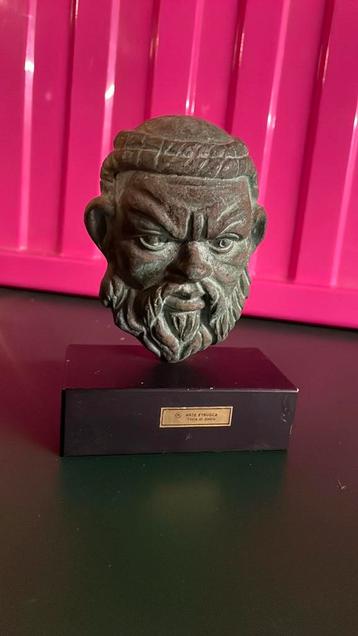 Bronzen beeldje masker van arte etrusca beschikbaar voor biedingen
