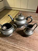 Te koop tinnen theepot, suikerpot en melkkannetje, Ophalen