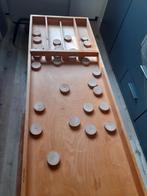 Grote sjoelbak, Ophalen