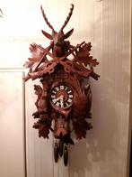 Handgemaakte koekkoeks klok, Ophalen