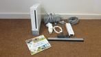 Wii met controller en nunchuck, Spelcomputers en Games, Ophalen of Verzenden, Zo goed als nieuw, Met 1 controller, Met games