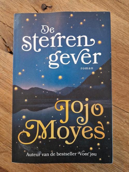Jojo Moyes - De sterrengever, Boeken, Literatuur, Zo goed als nieuw, Ophalen of Verzenden